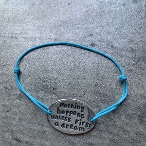 Silver Bracelet “Nothing happens unless...”